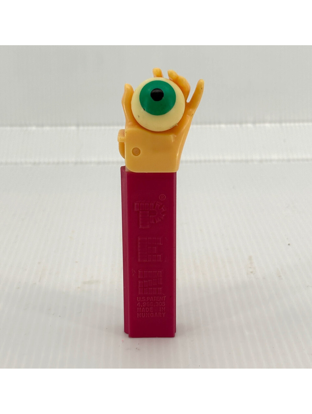 Vintage Pez Dispenser-Pat. # 4.9-Hungary-Psychedelic Eye-No Feet-C207 Hand
